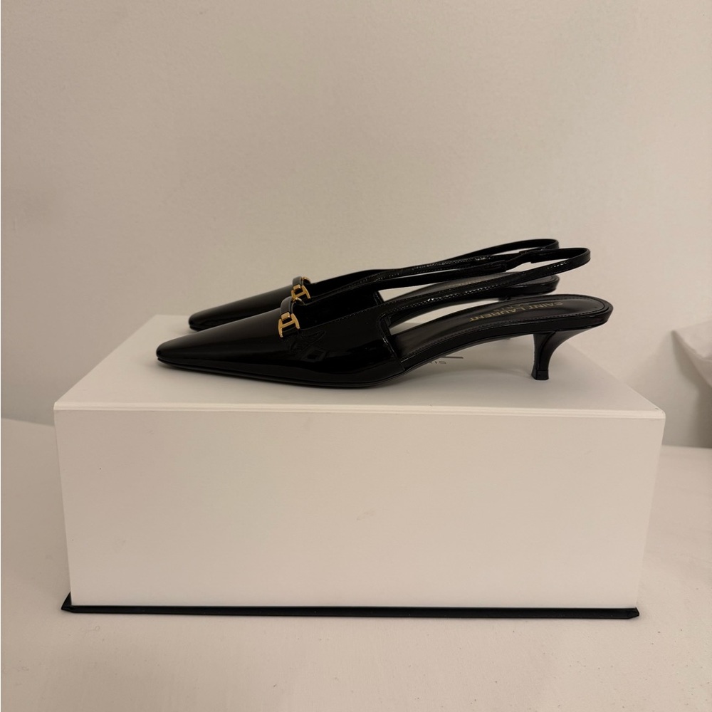 🚫SOLD!!!🚫 Saint Laurent Black and Gold Slingback Heels